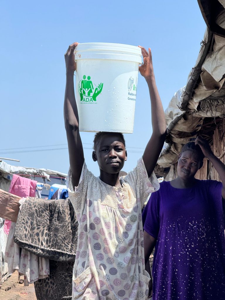 a picture of a wash nfis participant after fetching water at renk transit center one tc1 in renk county upper nile state taken on 24 october 2024 1